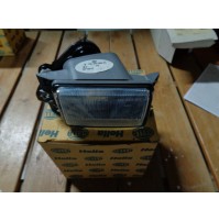 M10452 - FENDINEBBIA HELLA VW PASSAT '88 - '93 - 005566051